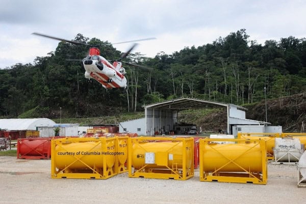 Helicopter lifting Xrosswater crates in the Peruvian Amazon