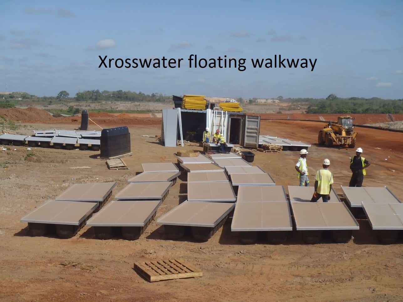 Local team laying out Xrosswater sections at the iron ore mine in Sierra Leone